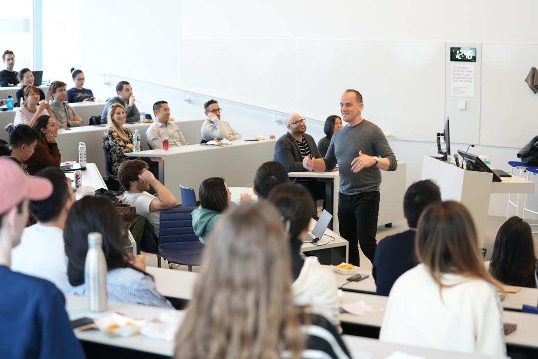 instructor teaching in front of class