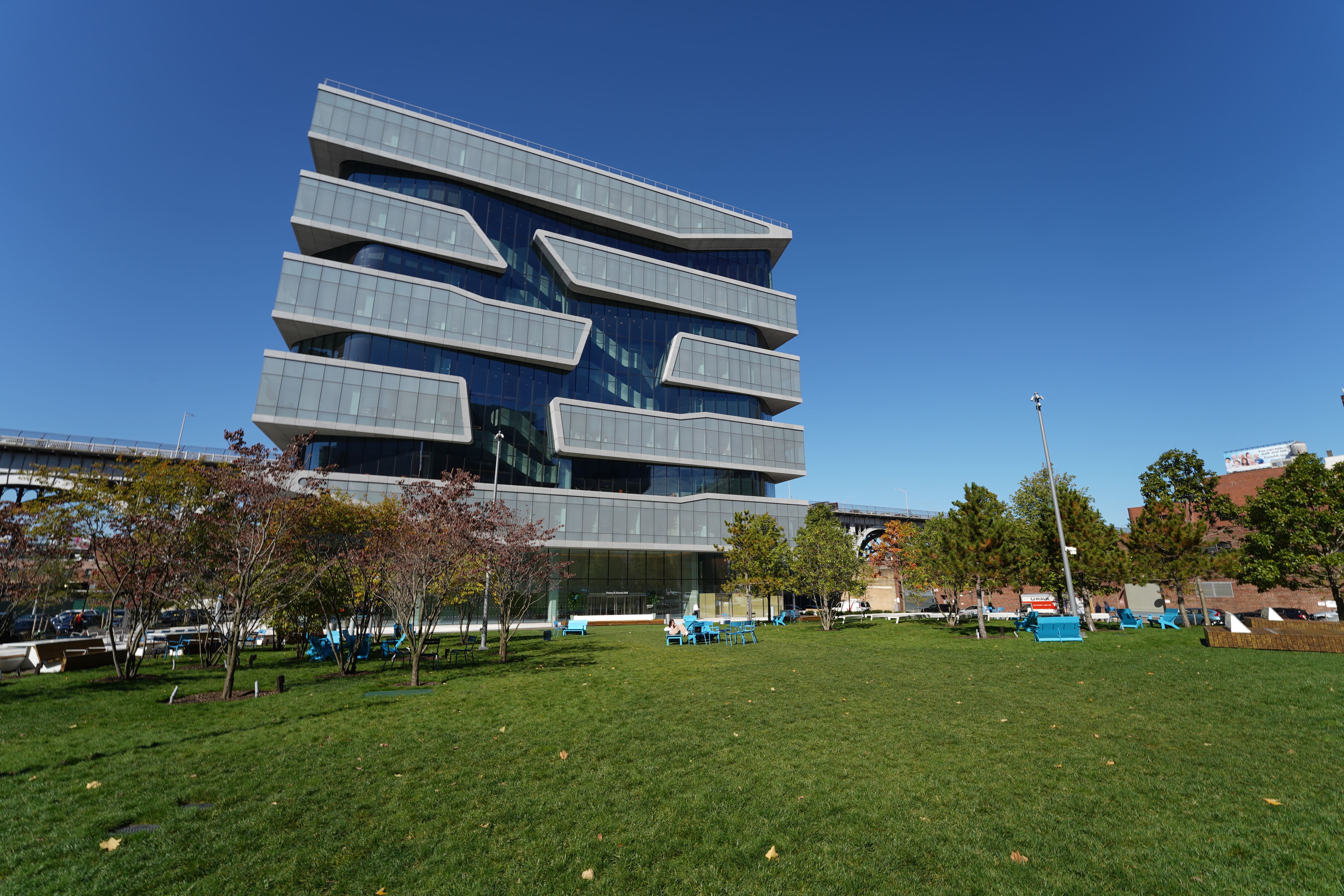 Kravis Hall, across the green grass Square