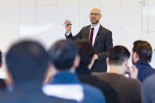 Professor Michael Ewens speaks to the MBA PE Finance Class