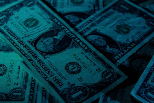 U.S. dollar banknote. Photo by Aidan Bartos on Unsplash.