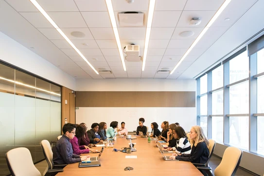 People having meeting on rectangular brown table photo – Free Office Image on Unsplash. Photo by Christina @ wocintechchat.com on Unsplash.
