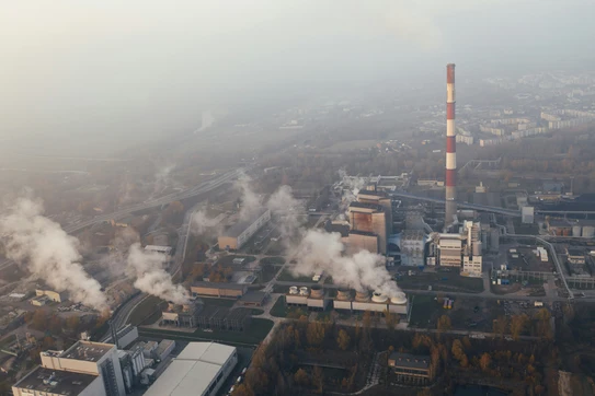 White smoke coming out from building photo. Photo by Marcin Jozwiak on Unsplash.