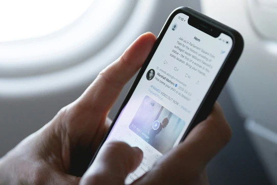 person scrolling on twitter