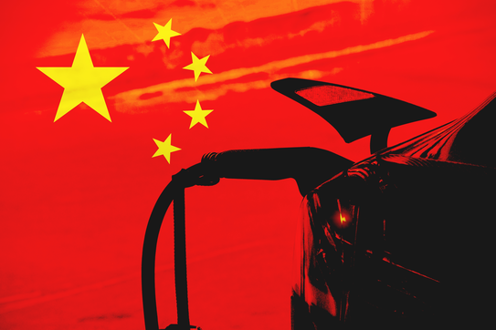 A Chinese flag and an electric car