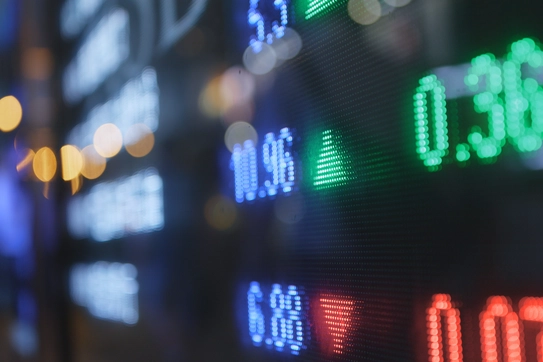 A board showing stock prices