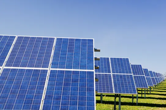 Solar power plant. Photo by Zbynek Burival on Unsplash.