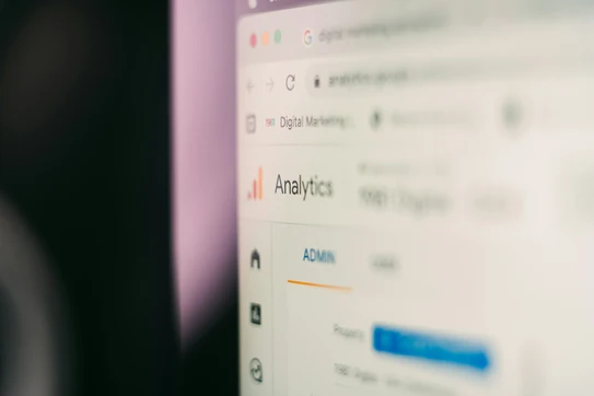 A very close-up view of the corner of a computer screen, one word viewable: "Analytics"