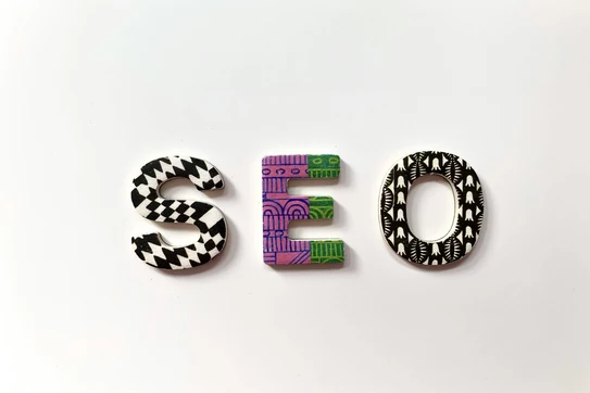 The letters S, E, and O on a white background