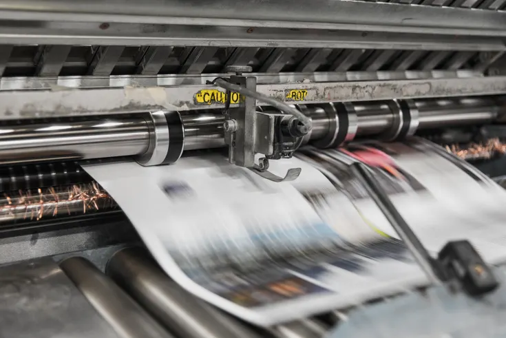Printing press. Bank Phrom on Unsplash