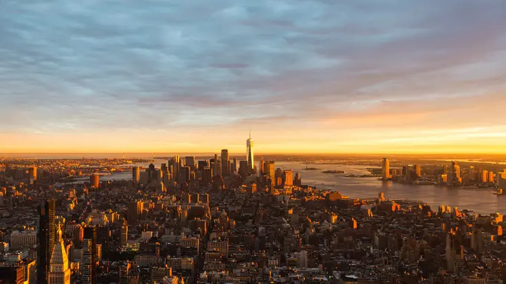 Aerial view of Manhattan at sunrise. Photo by Johannes Hurtig on Unsplash.