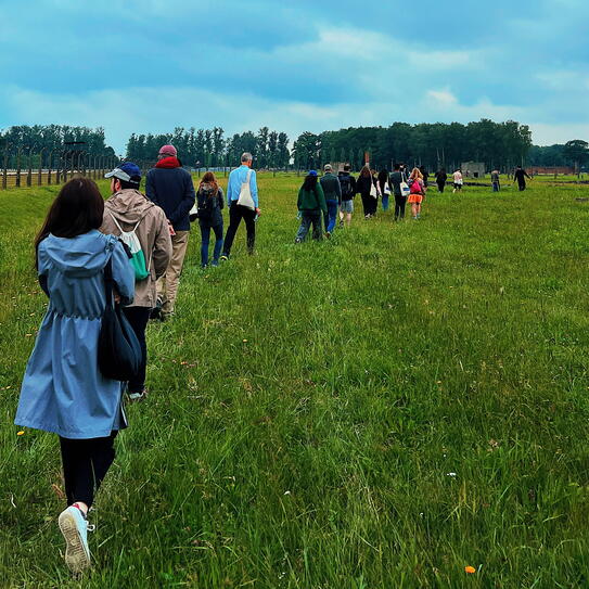 FASPE cohort walking through Auschwitz 